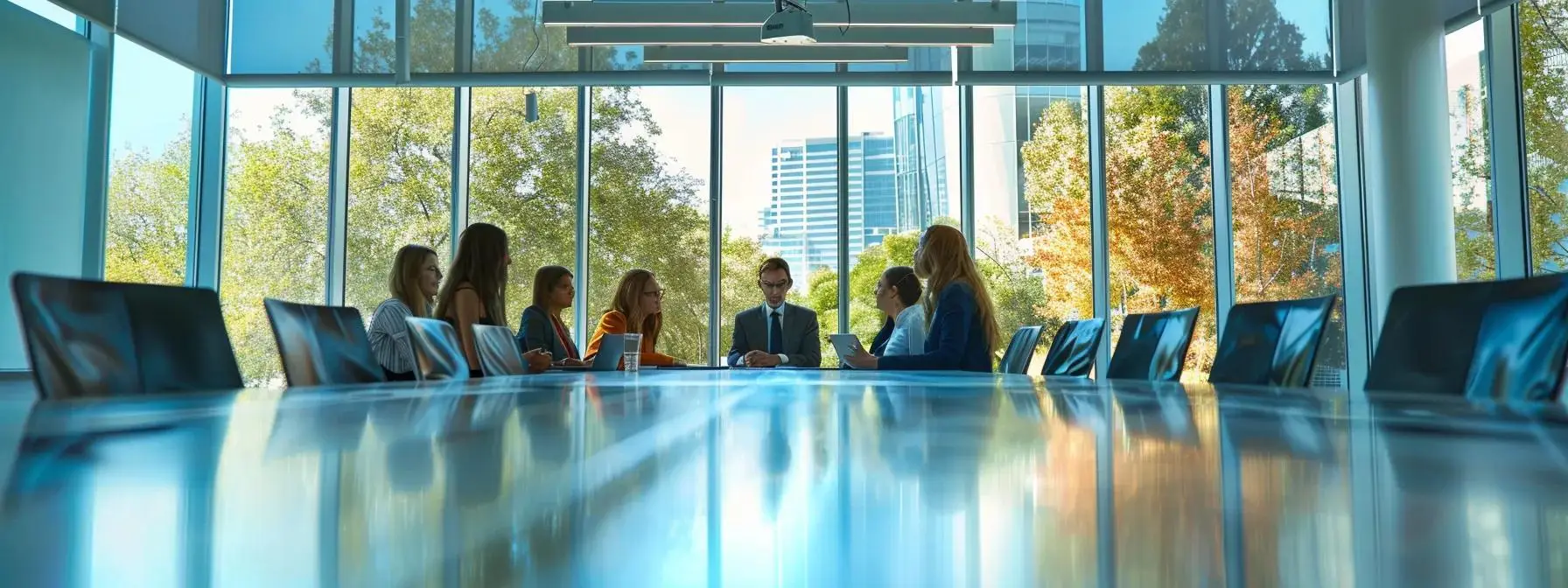 a focused view of a modern conference room featuring a diverse group of individuals engaged in a mediation session, with a mediator guiding the discussion at a sleek table, emphasizing the collaborative and cost-effective nature of divorce mediation in texas.
