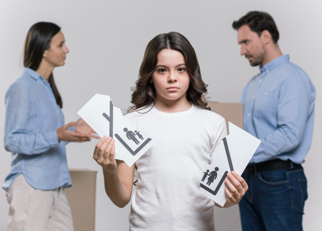 portrait-sad-girl-with-parents-arguing